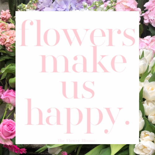 flowers make us happy wording over background flowers